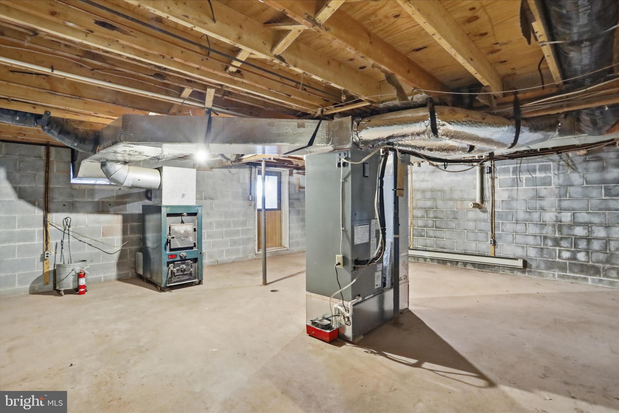 7968 Cromwell Road Three Springs, PA 17264 - Photo 44 of 68 Coal/Wood Stove and new air handler