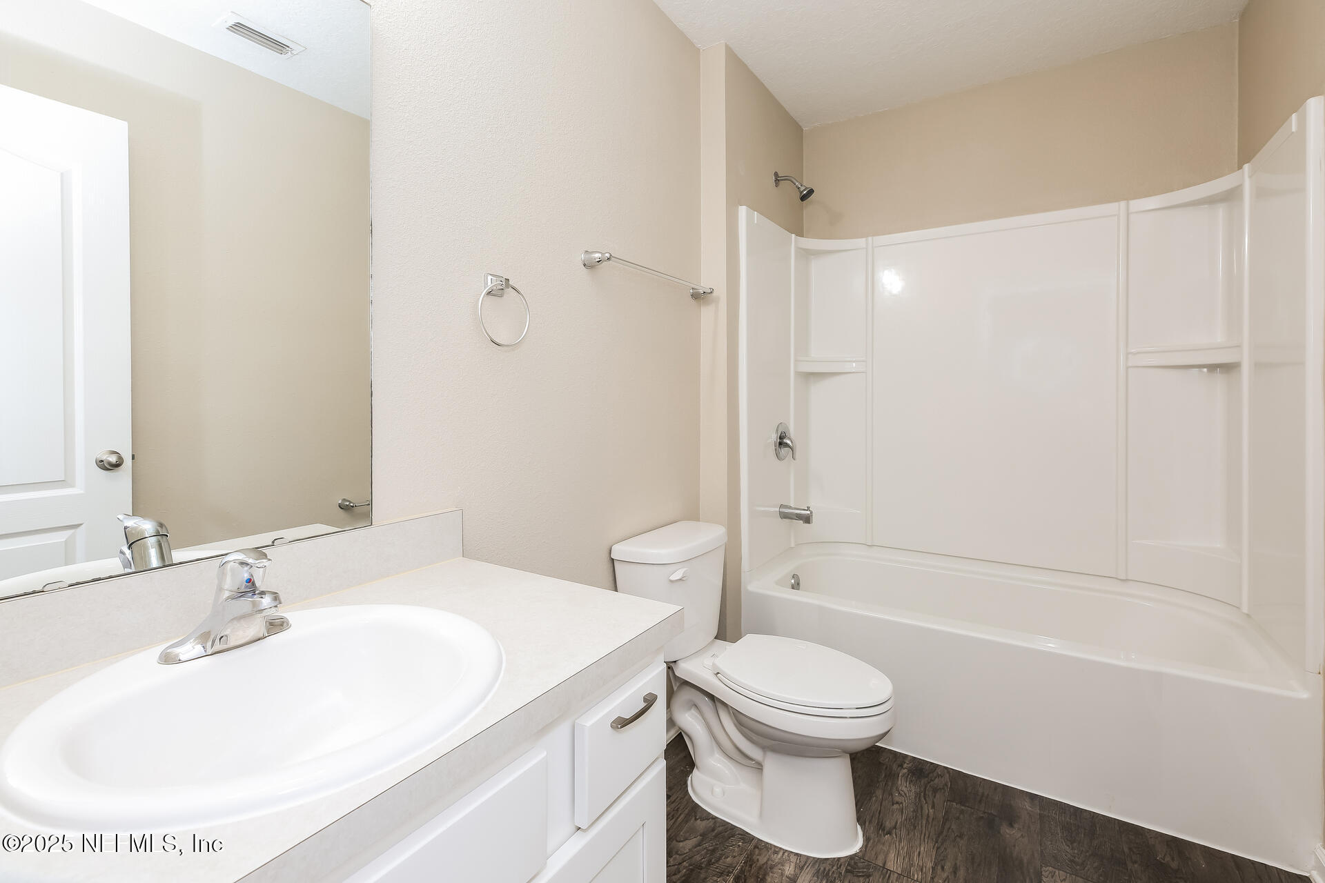 43 Cody Street St. Augustine, FL 32084 - Photo 5 of 15 a bathroom with a toilet a sink and a bathtub