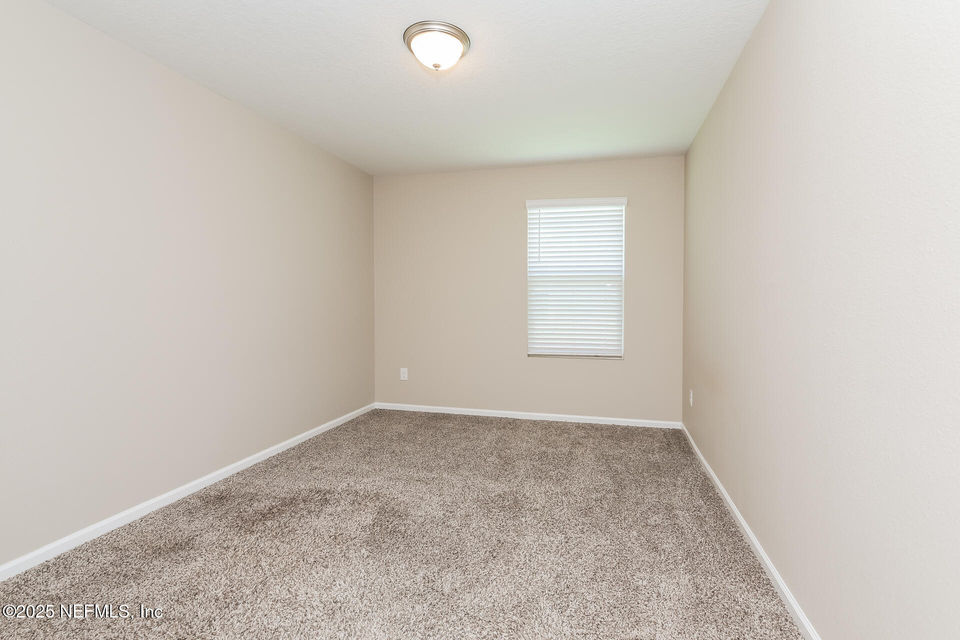 43 Cody Street St. Augustine, FL 32084 - Photo 8 of 15 an empty room with a window