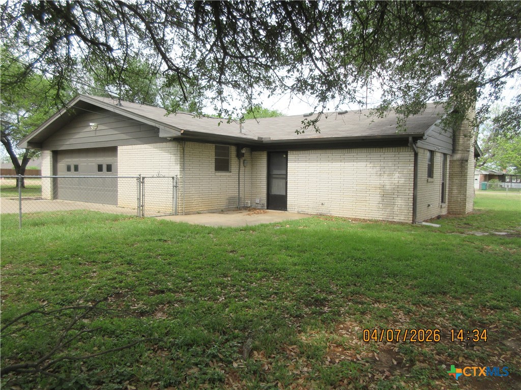 506 East Loop 121 Belton, TX 76513 - Photo 17 of 29 a house that is sitting in the grass