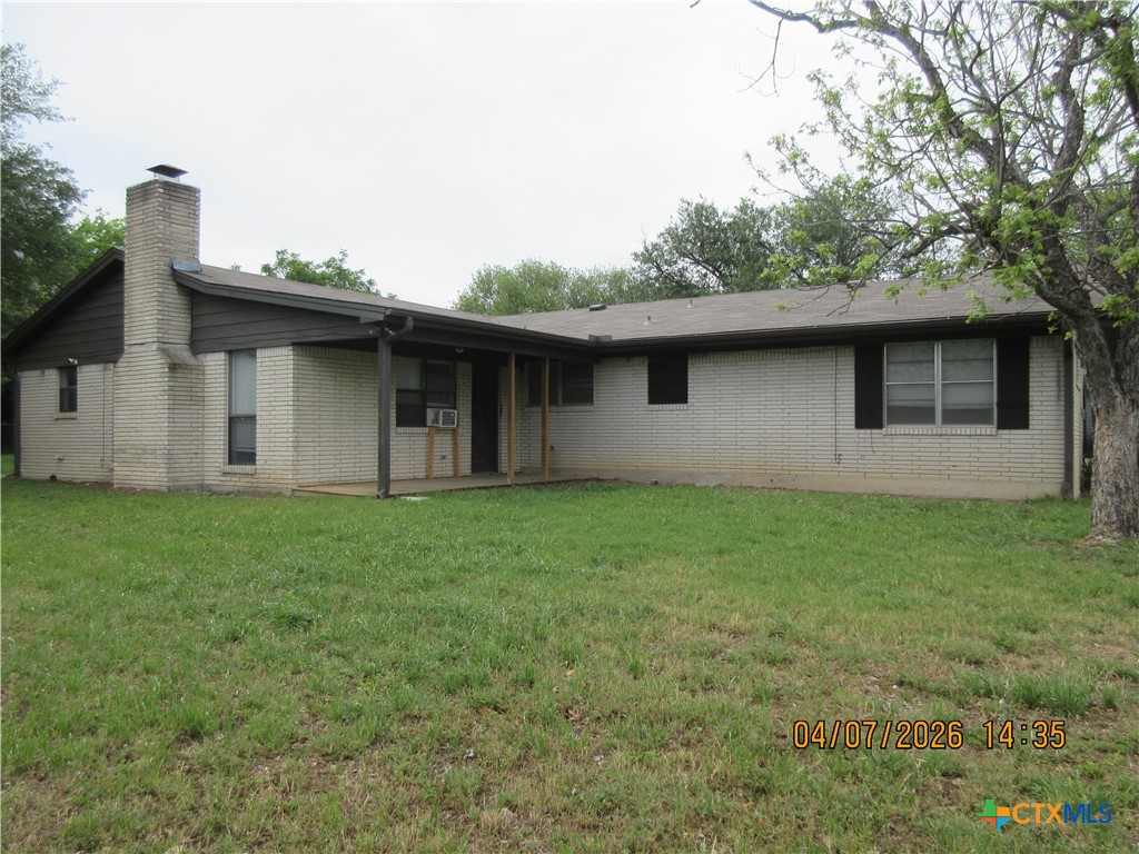 506 East Loop 121 Belton, TX 76513 - Photo 18 of 29 a backyard of a house with lots of green space