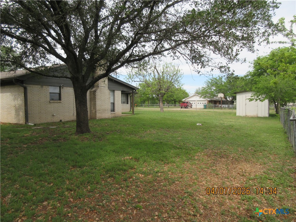 506 East Loop 121 Belton, TX 76513 - Photo 19 of 29 a white house that has a tree in it