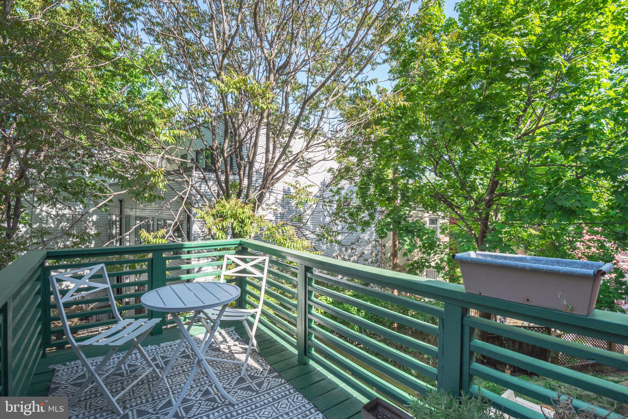2307 15th Street Northwest, Unit 1 Washington, DC 20009 - Photo 39 of 43 a view of a chairs in a deck