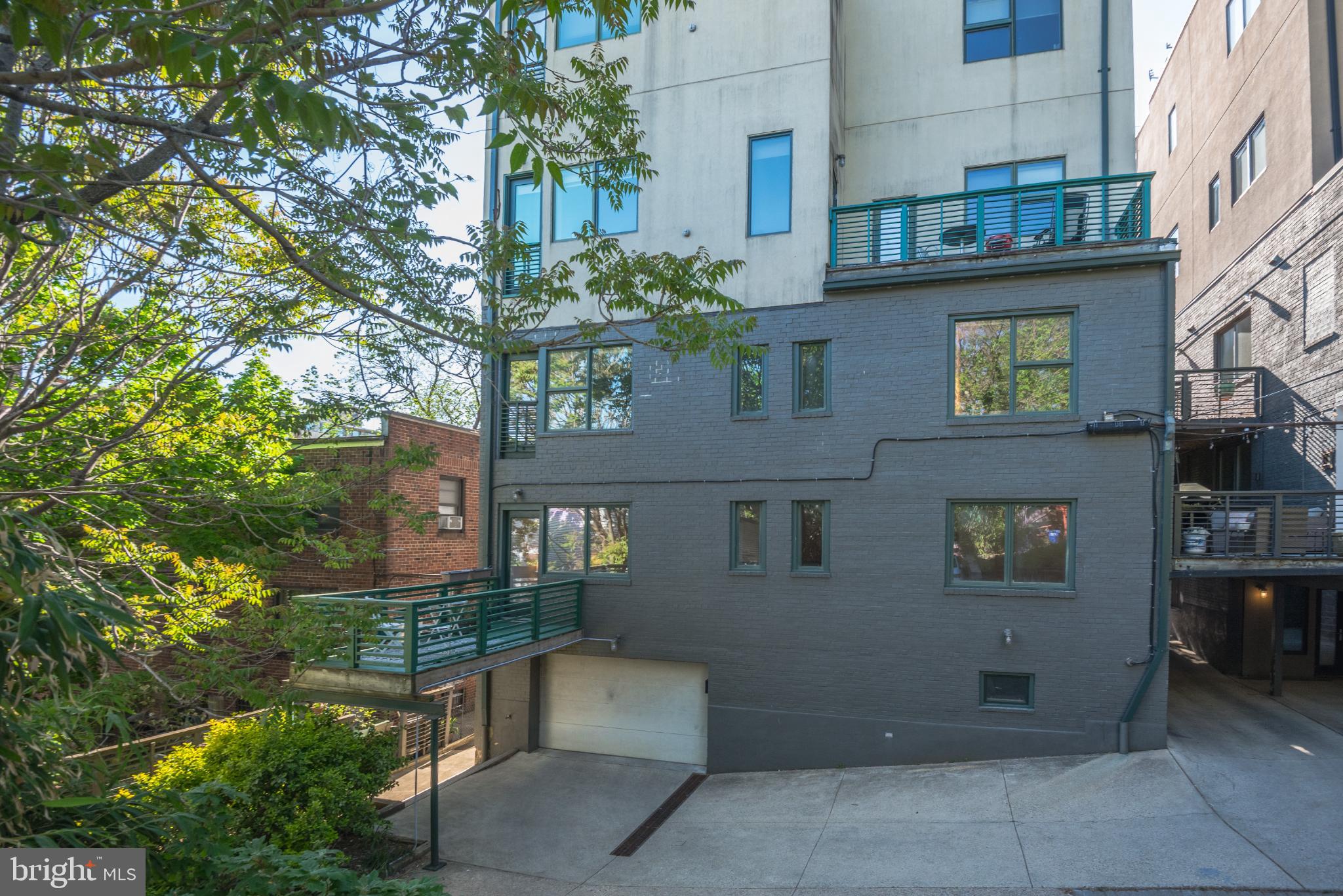 2307 15th Street Northwest, Unit 1 Washington, DC 20009 - Photo 41 of 43 a view of a building with a potted plant