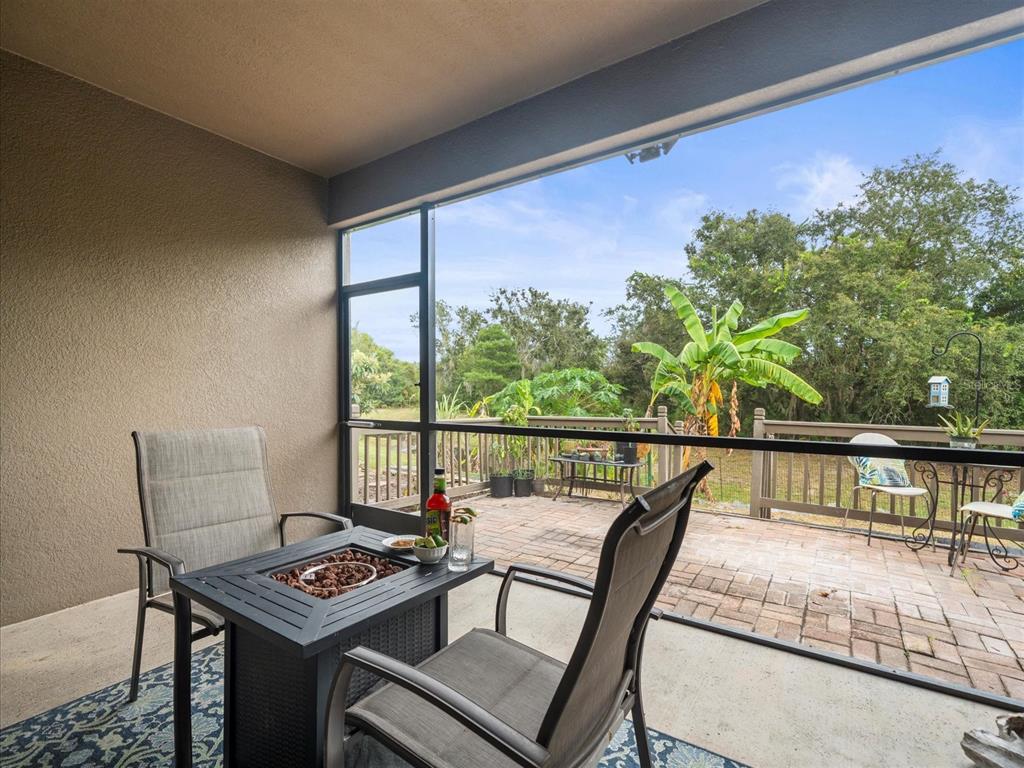 12722 Drakefield Drive Spring Hill, FL 34610 - Photo 42 of 45 a view of a balcony with chairs