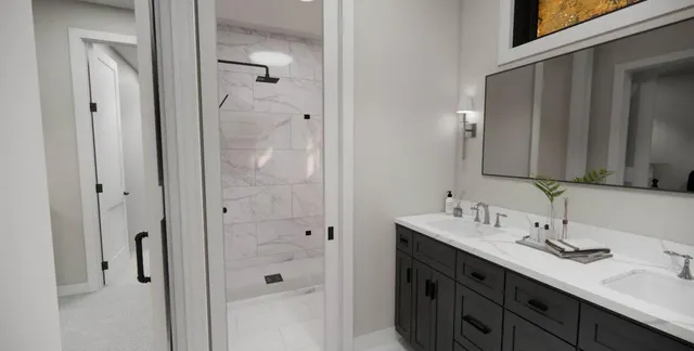 a bathroom with a double vanity sink and mirror