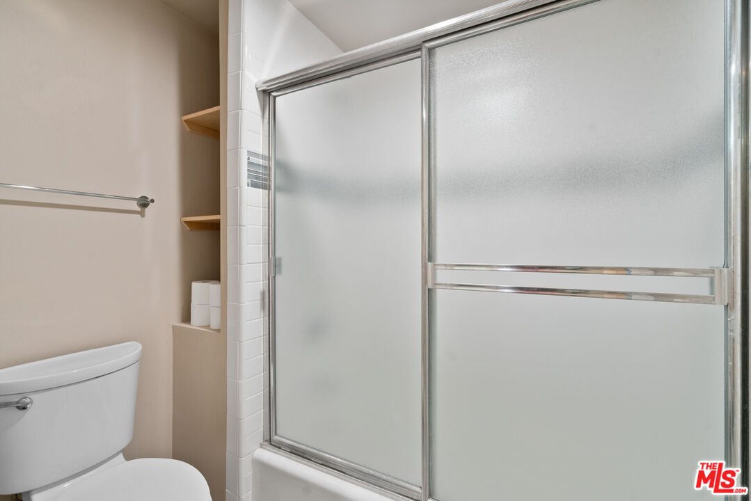630 West 28th Street, Unit 4 Los Angeles, CA 90007 - Photo 33 of 33 a bathroom with a shower and a toilet
