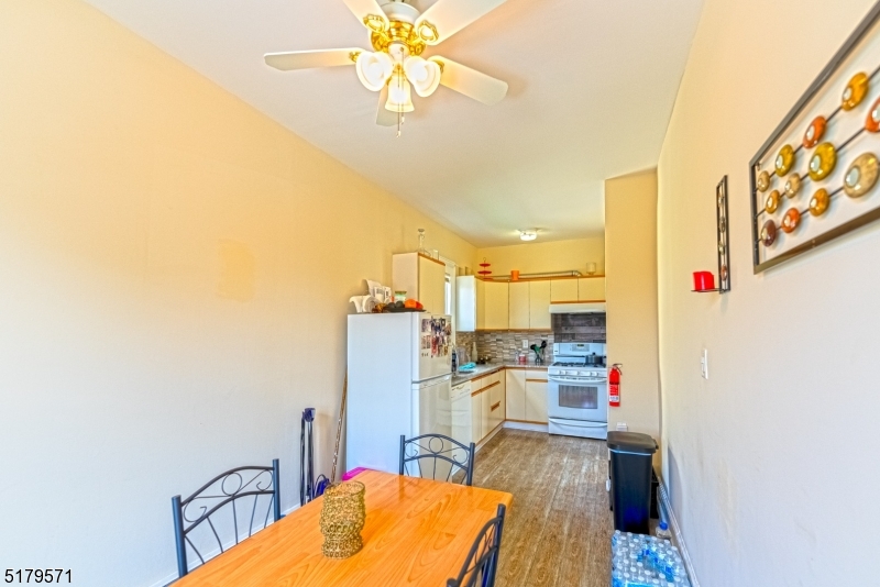146 Main Street, Unit 2 Garfield, NJ 07026 - Photo 14 of 14 a view of a kitchen with workspace and a window