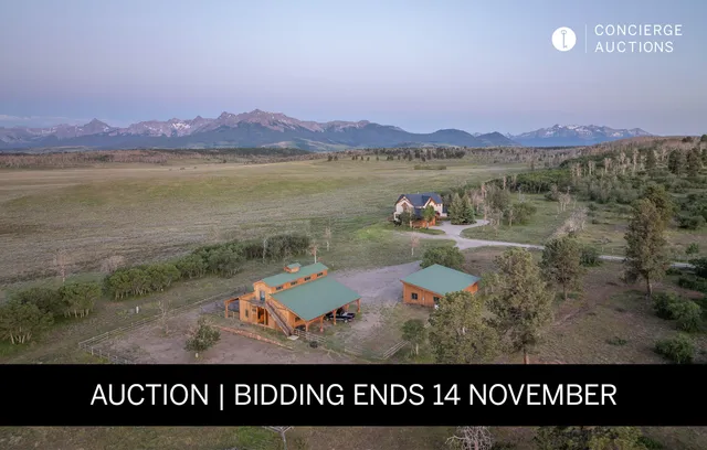 a view of a water fountain and an entrance to the building