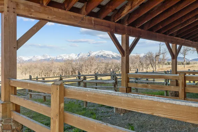 an outdoor space with furniture and umbrella