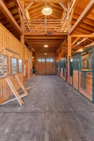 a view of a dry yard with mountains in the background