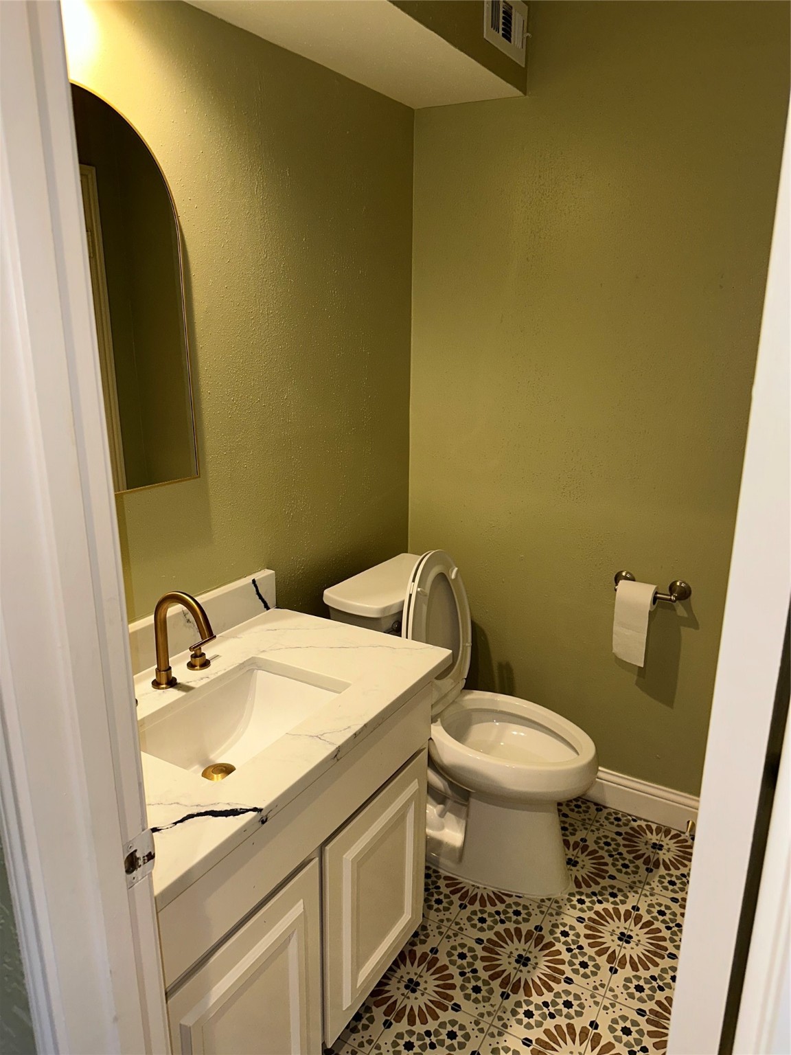 14663 Perthshire Road, Unit 14663 Houston, TX 77079 - Photo 11 of 35 a bathroom with a sink and a toilet