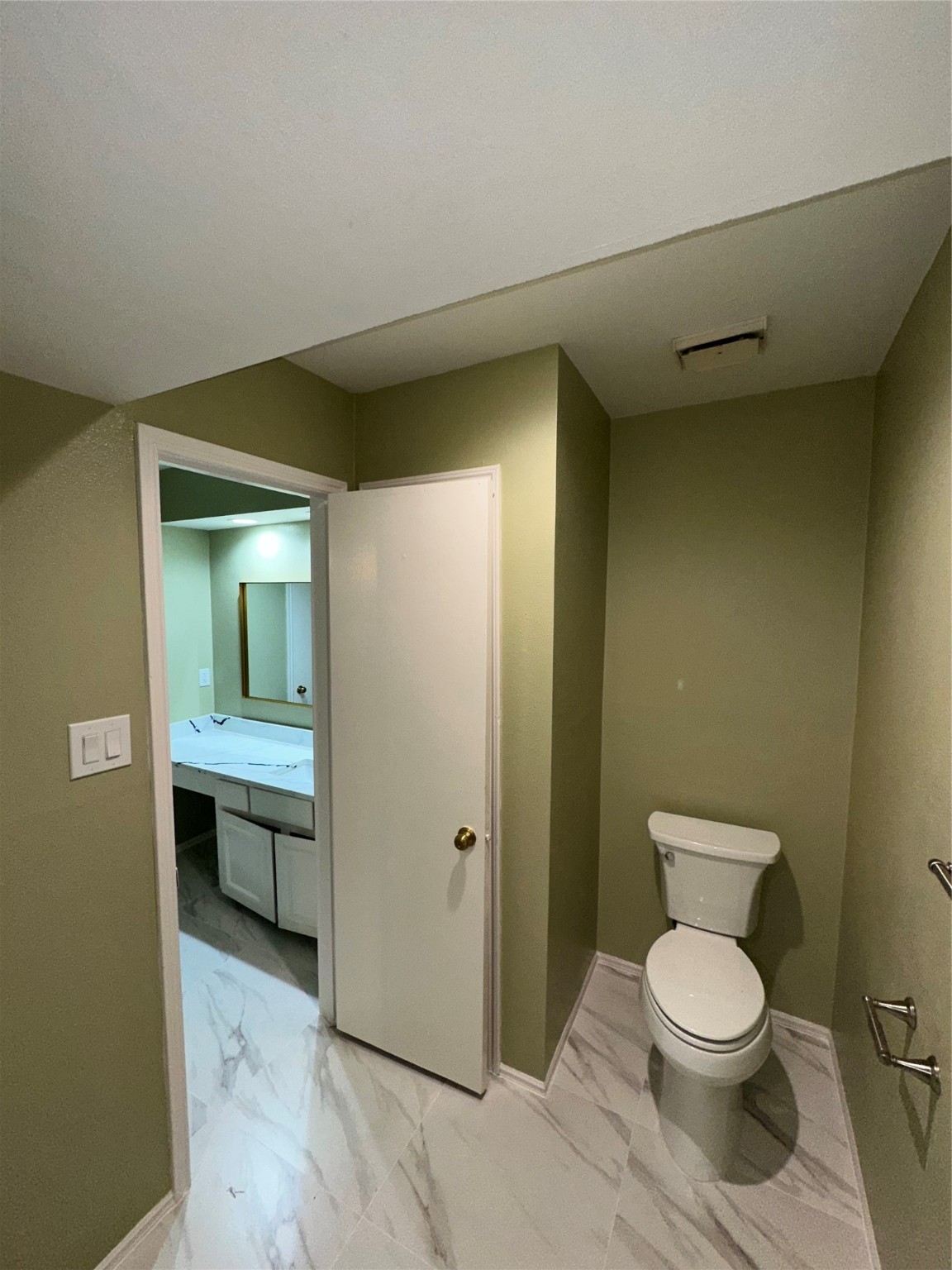 14663 Perthshire Road, Unit 14663 Houston, TX 77079 - Photo 14 of 35 a bathroom with a toilet and a sink