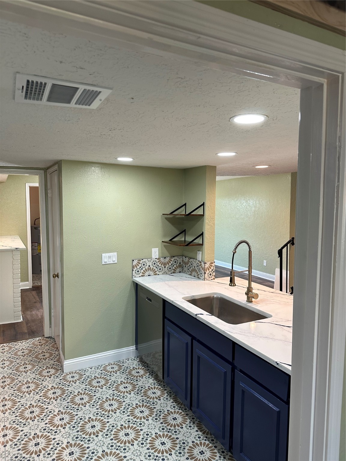 14663 Perthshire Road, Unit 14663 Houston, TX 77079 - Photo 27 of 35 a bathroom with a sink and a mirror
