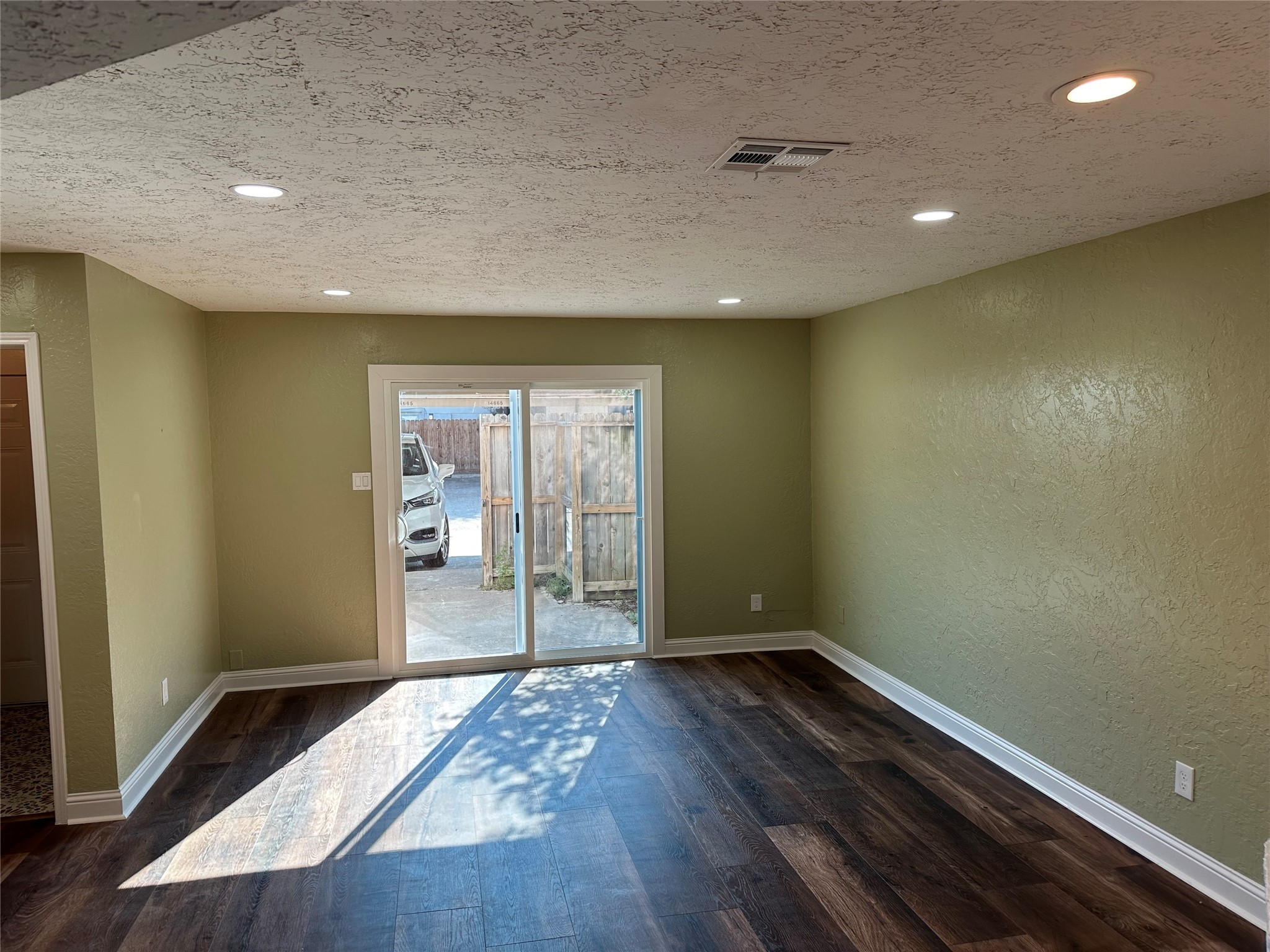 14663 Perthshire Road, Unit 14663 Houston, TX 77079 - Photo 3 of 35 a view of hallway with wooden floor