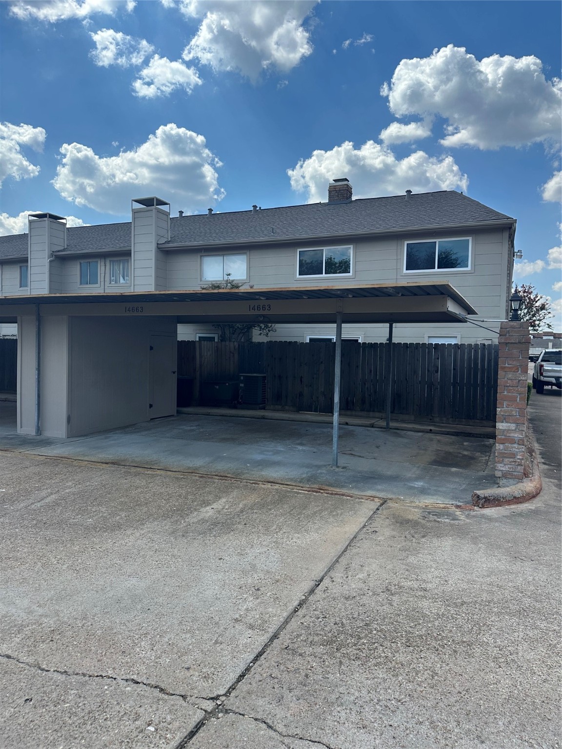 14663 Perthshire Road, Unit 14663 Houston, TX 77079 - Photo 34 of 35 a view of a house with a yard