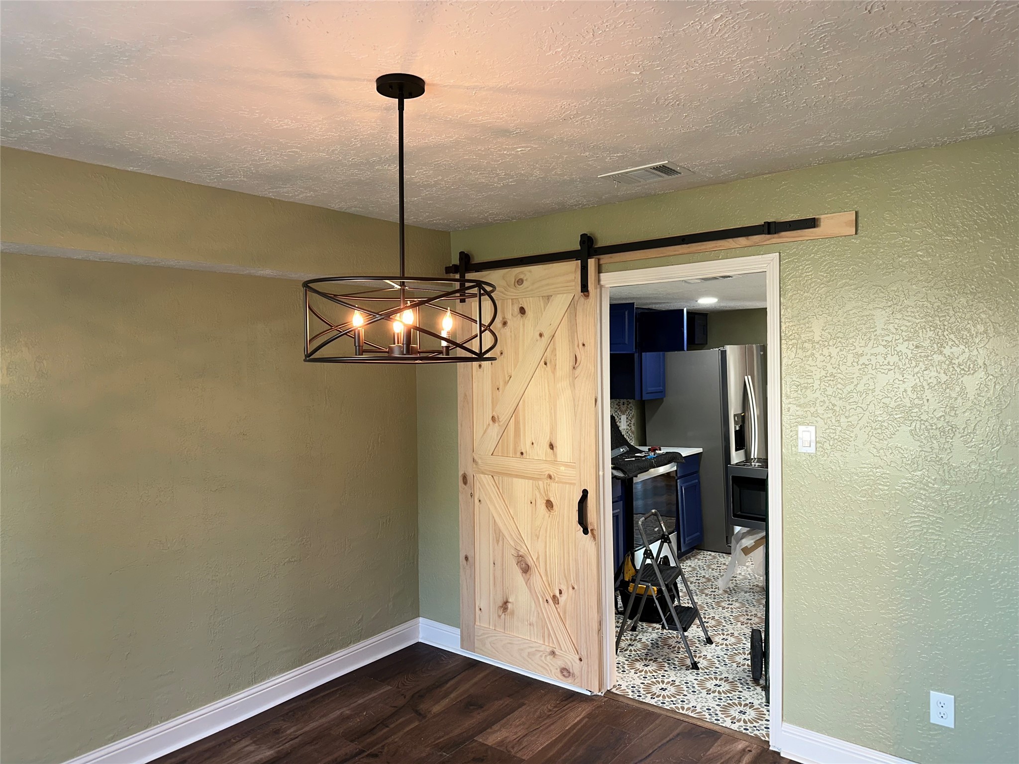 14663 Perthshire Road, Unit 14663 Houston, TX 77079 - Photo 6 of 35 a view of a room with wooden floor closet and windows