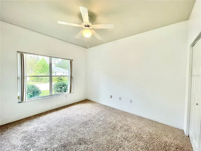 a room with a sink and a mirror