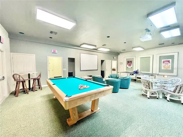 a group of people sitting at tables