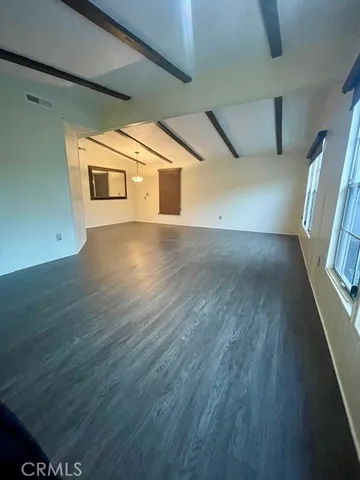 a view of a house with wooden floor