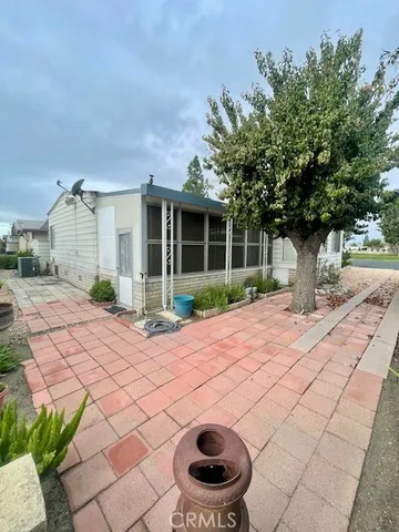 a house view with a backyard space