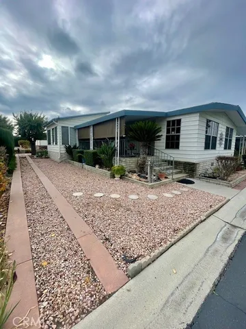 a view of a house with entertaining space