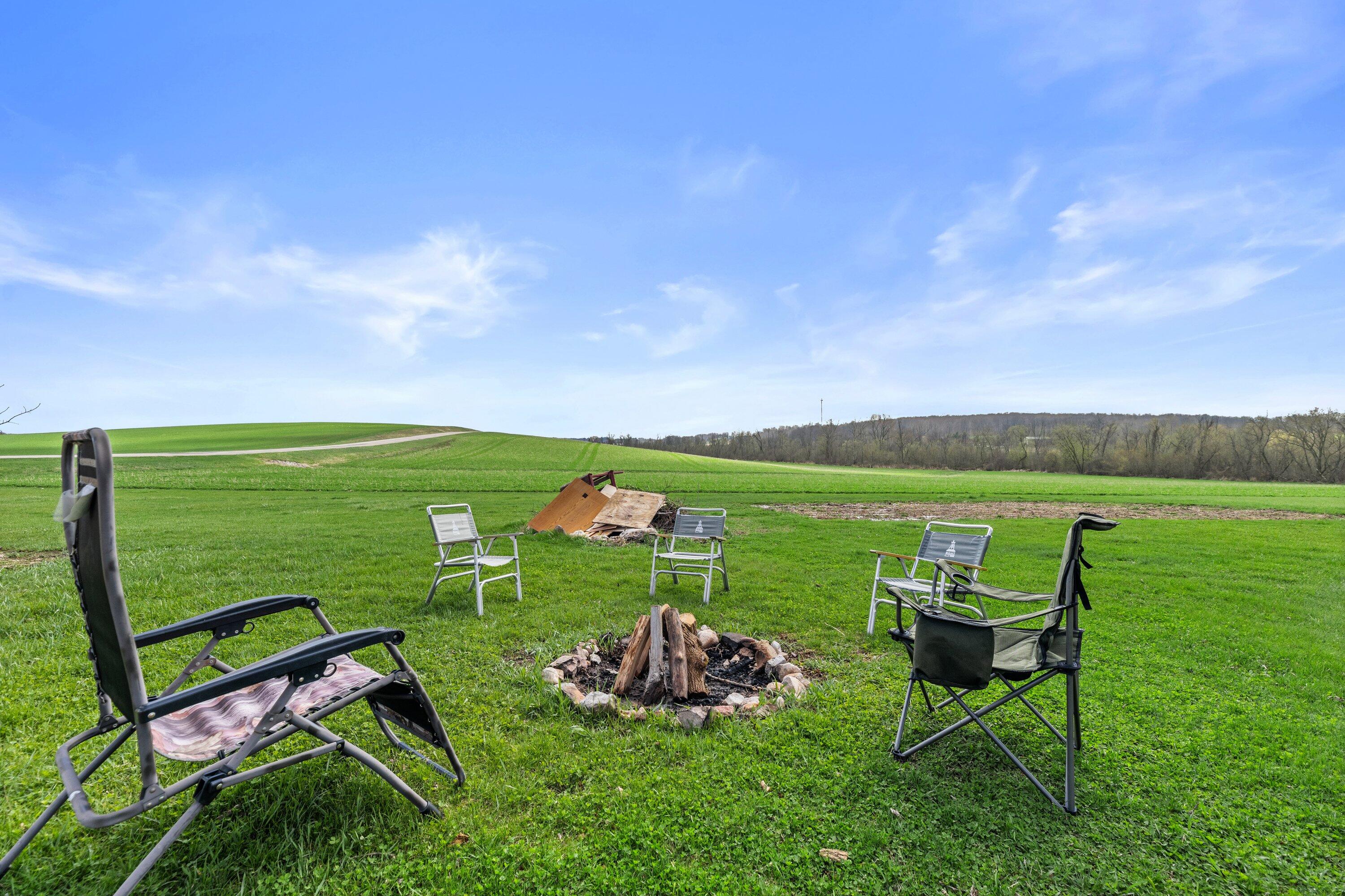 7293 Aurora Road Addison, WI 53090 - Photo 81 of 95 firepit