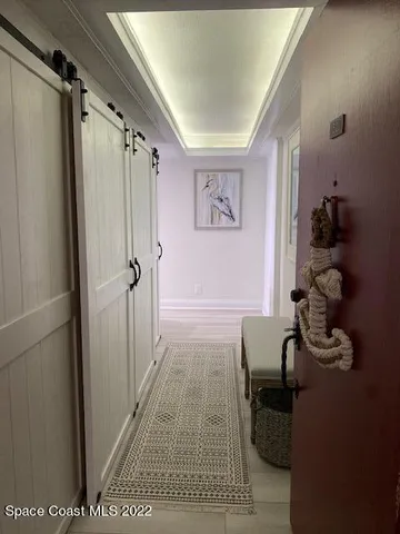 a bathroom with a tub shower and a sink