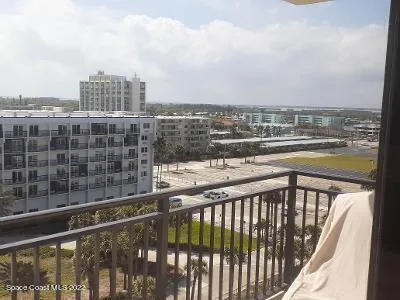 a view of a balcony with city view