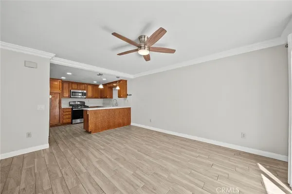 a view of kitchen with wooden floor