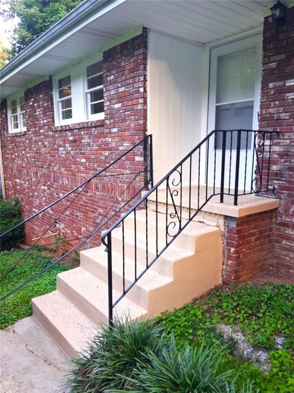 1915 Wee Kirk Road Southeast Atlanta, GA 30316 - Photo 4 of 23 a view of a house with backyard and deck