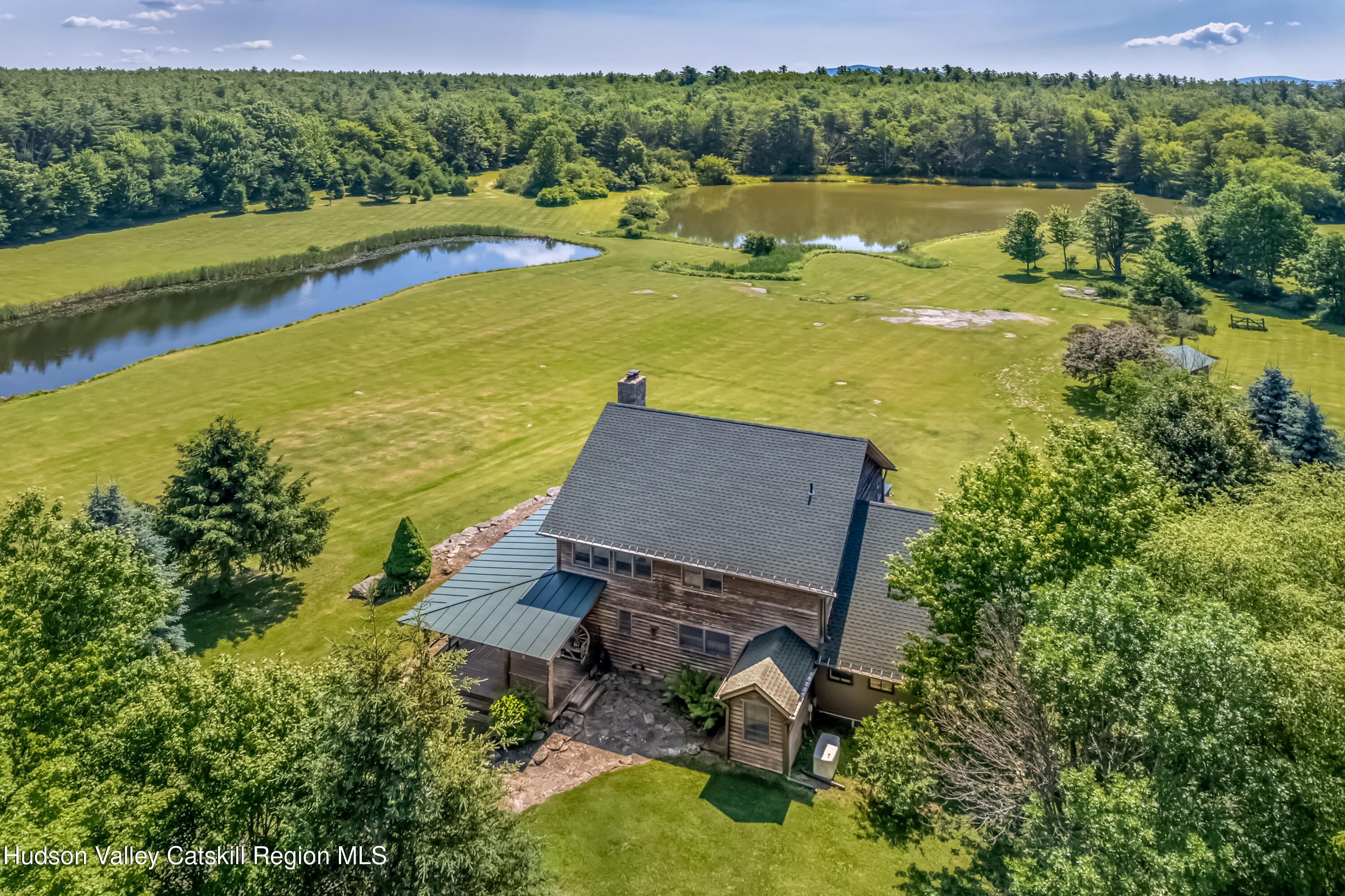 688 Bruce Porn Road Gilboa, NY 12167 - Photo 28 of 104 an aerial view of a house with a yard lake view and mountain view