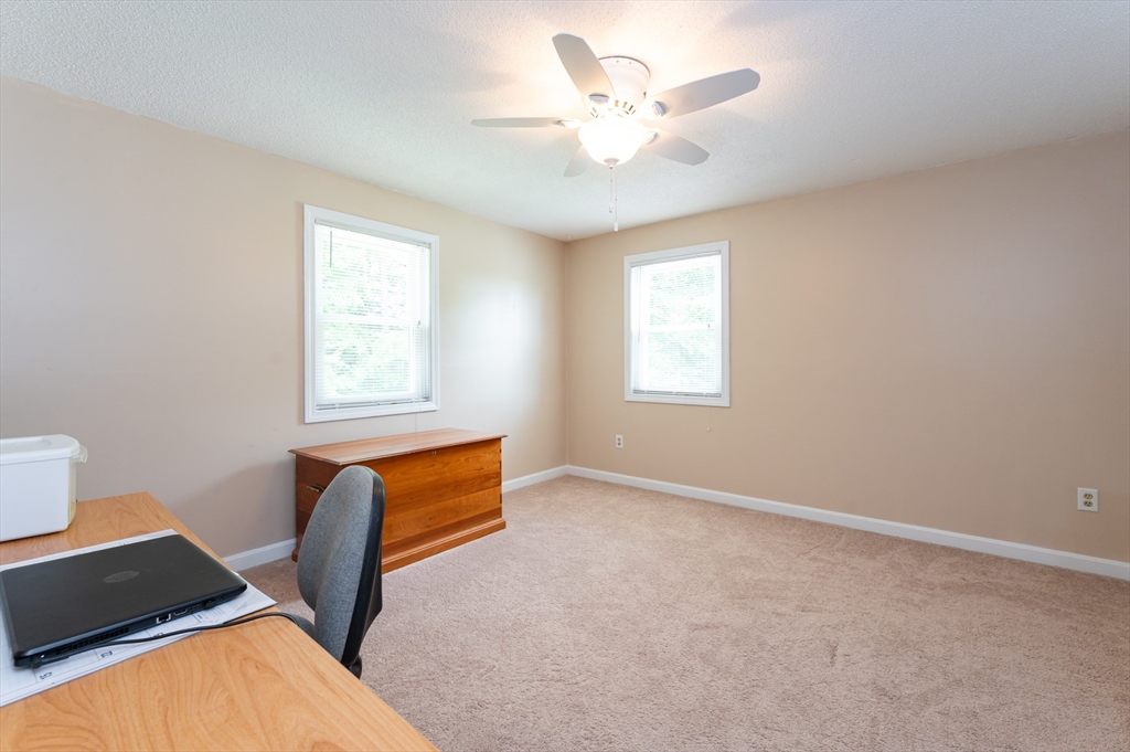 11 Emerson Road Nashua, NH 03062 - Photo 18 of 35 a view of an empty room with a window