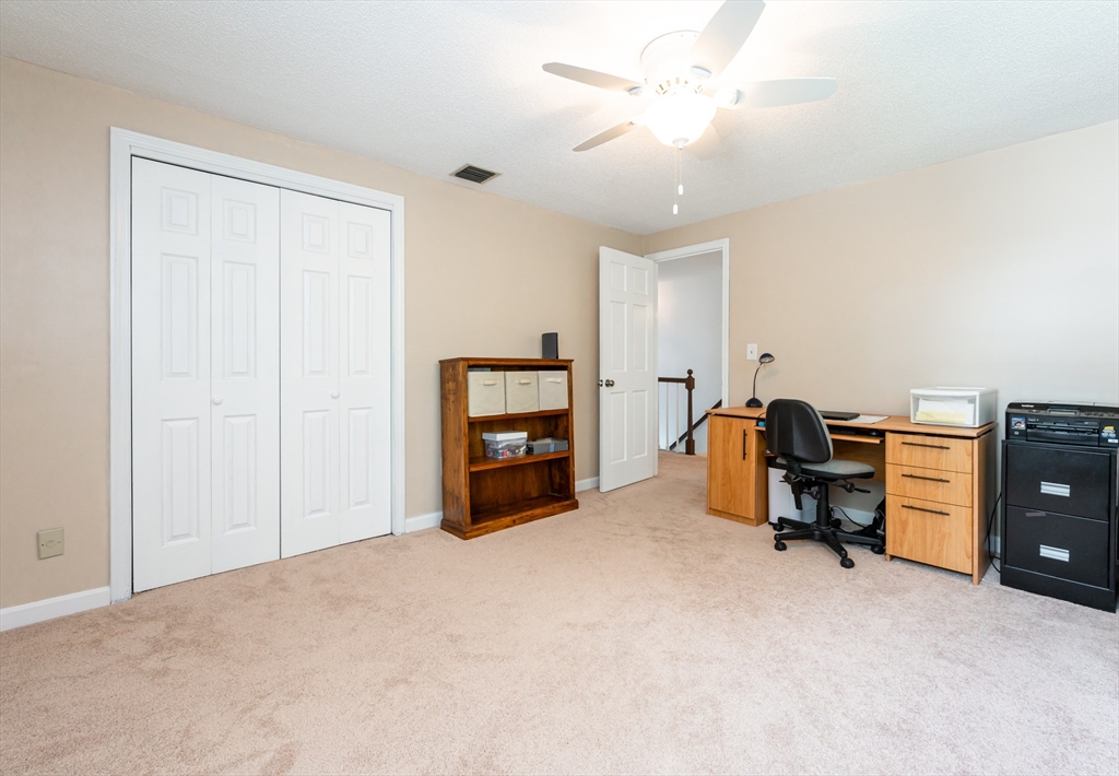11 Emerson Road Nashua, NH 03062 - Photo 19 of 35 a view of a workspace with furniture