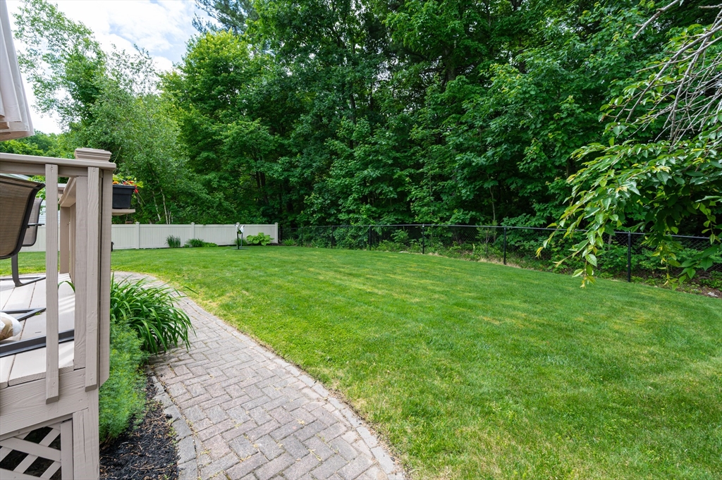 11 Emerson Road Nashua, NH 03062 - Photo 29 of 35 a view of a backyard with a garden