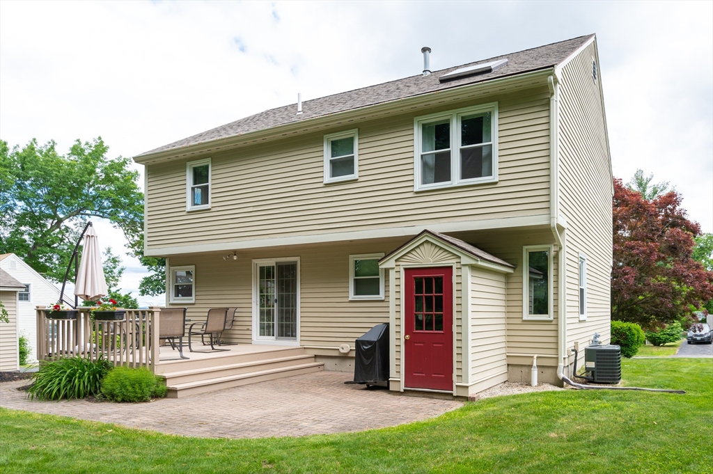 11 Emerson Road Nashua, NH 03062 - Photo 30 of 35 a front view of a house with a yard