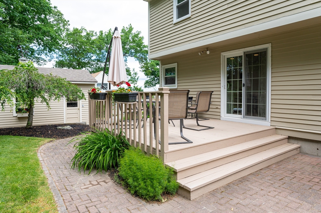 11 Emerson Road Nashua, NH 03062 - Photo 31 of 35 a view of house with backyard and outdoor seating