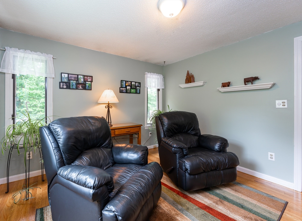 11 Emerson Road Nashua, NH 03062 - Photo 6 of 35 a living room with furniture and a window