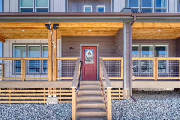 a front view of a house with a porch