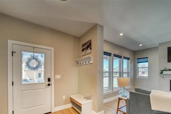 a living room with furniture and windows