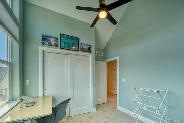 a view of a hallway with workspace