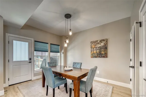 a view of a dining room with furniture