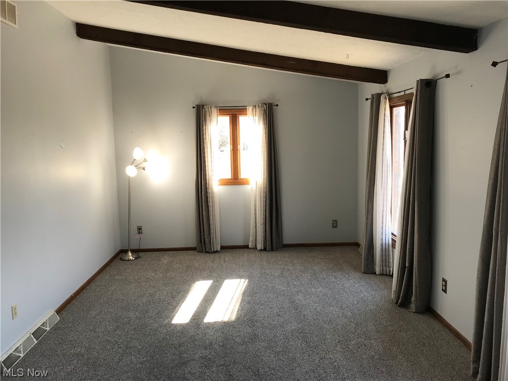 1610 Schroeder Road Mogadore, OH 44260 - Photo 9 of 46 Living room with vaulted ceiling