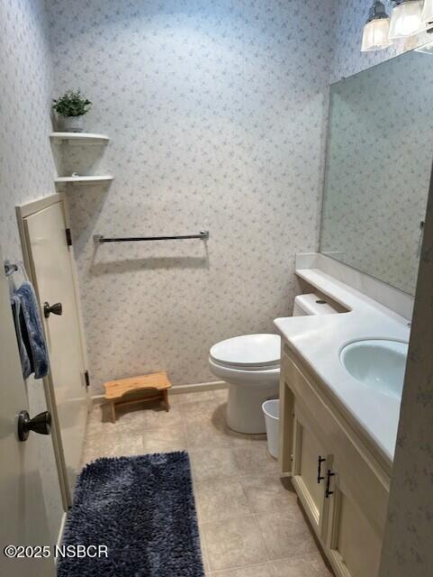 66 Stanford Circle Lompoc, CA 93436 - Photo 11 of 23 a bathroom with a sink and a toilet