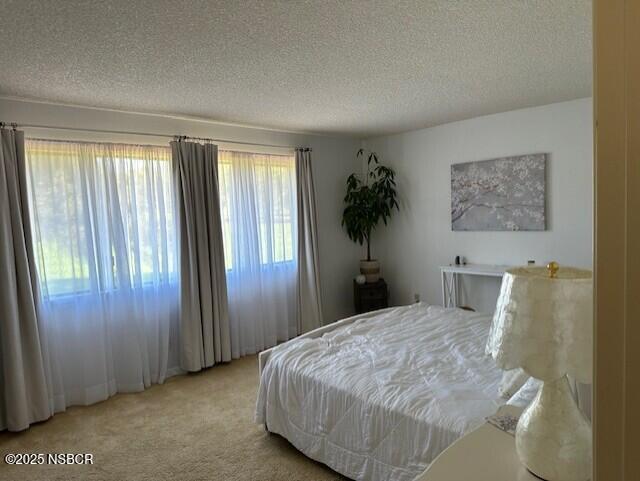 66 Stanford Circle Lompoc, CA 93436 - Photo 16 of 23 a bedroom with a bed and a window