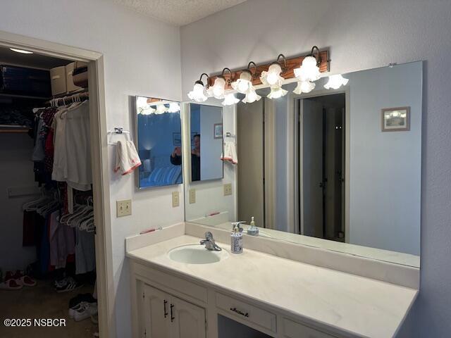 66 Stanford Circle Lompoc, CA 93436 - Photo 18 of 23 a bathroom with a sink vanity and a mirror