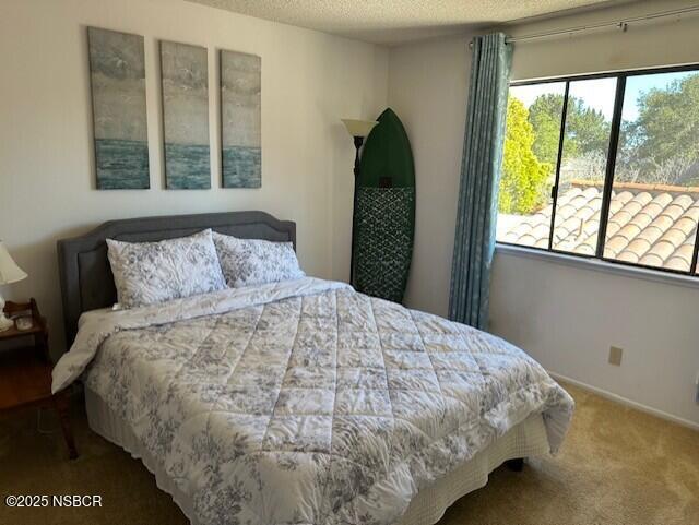 66 Stanford Circle Lompoc, CA 93436 - Photo 19 of 23 a large bed sitting in a bedroom next to a window