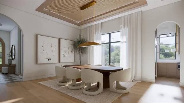 a kitchen with a sink a window and cabinets