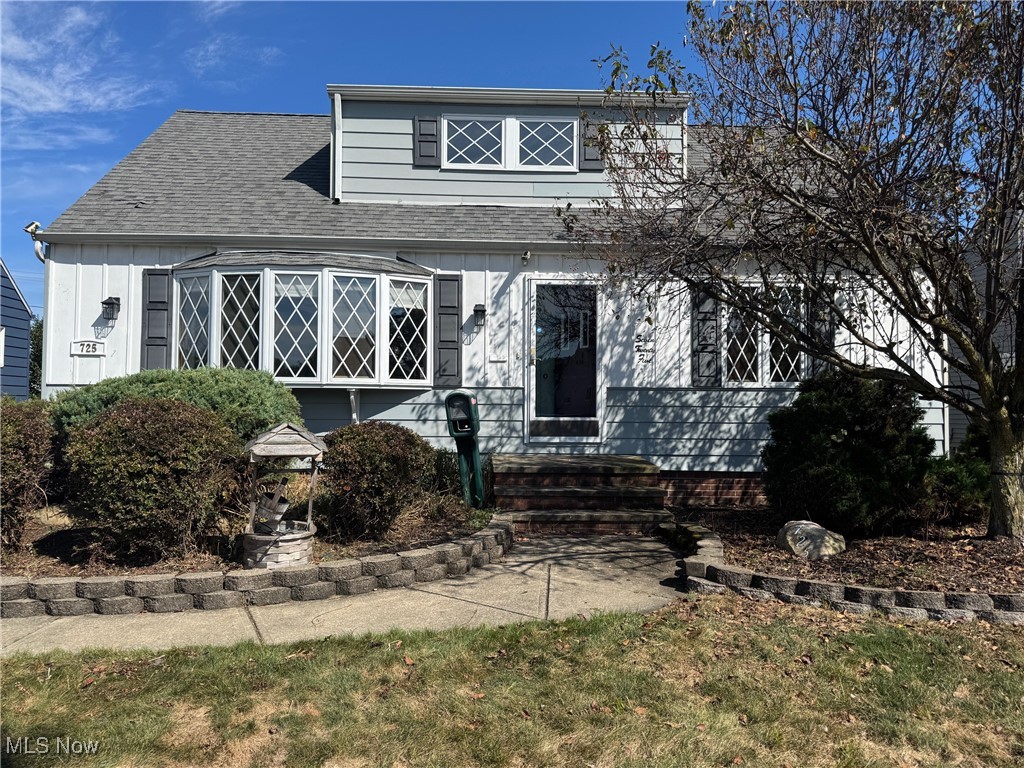 725 Pendley Road Willowick, OH 44095 - Photo 2 of 36 View of front of home with dimensional roof and landscape border