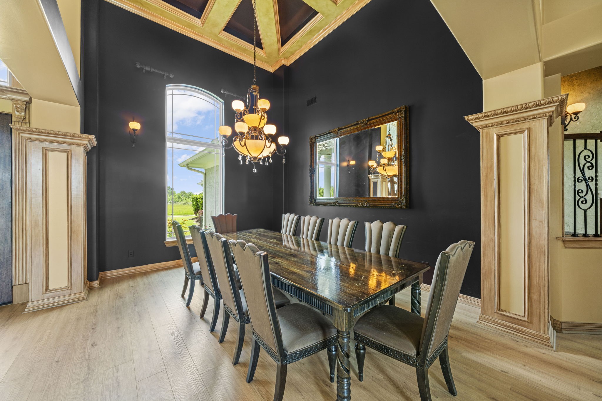 18732 Kz Road Cypress, TX 77433 - Photo 17 of 49 From holiday feasts to intimate dinners, this large formal dining room brings unparalleled character with its exposed beams and classic chandelier.